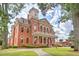 Historic brick courthouse with clock tower, ornate trim, and landscaped grounds at 1257 Pj East Rd, Covington, GA 30014