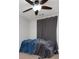 Bedroom featuring a ceiling fan and fixture with a bed and coverings at 4003 Maple Ridge Nw Ln, Acworth, GA 30101