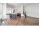 Open concept living space with kitchen and stairs at 1250 Oxley Nw Ln, Atlanta, GA 30307