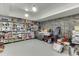 Organized basement featuring ample storage shelves and durable flooring at 3441 Shoreland Dr, Buford, GA 30518