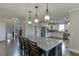 Spacious kitchen with an island, stainless steel appliances, and modern finishes at 3441 Shoreland Dr, Buford, GA 30518