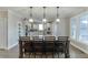 Kitchen with an island, stainless steel appliances, and natural light at 3441 Shoreland Dr, Buford, GA 30518