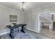 Office space featuring modern lighting, desk, and neutral color palette at 3441 Shoreland Dr, Buford, GA 30518