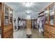 Well-organized walk-in closet with custom shelving and storage for clothing and accessories at 3441 Shoreland Dr, Buford, GA 30518