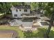 Backyard featuring a firepit, tiered landscaping, a pavilion, and a patio at 3981 Longview Dr, Chamblee, GA 30341