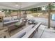 Spacious backyard patio with outdoor seating, landscaping, and a play area at 3981 Longview Dr, Chamblee, GA 30341
