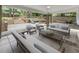 Relaxing backyard patio with comfortable seating, a well-maintained yard, and play area at 3981 Longview Dr, Chamblee, GA 30341