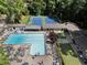 Aerial view of community pool and tennis courts, perfect for recreation and leisure in a beautiful setting at 3981 Longview Dr, Chamblee, GA 30341
