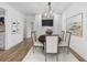 Bright dining room features hardwood floors, stylish lighting, and modern artwork at 3981 Longview Dr, Chamblee, GA 30341