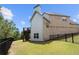 Brick and vinyl home with backyard and deck at 5075 Havenbrooke Ct, Cumming, GA 30040