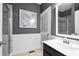 Bathroom with tiled floors, shower with glass door, and sink vanity at 5075 Havenbrooke Ct, Cumming, GA 30040