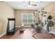 Home gym includes treadmill and weight machines for exercise at 5075 Havenbrooke Ct, Cumming, GA 30040
