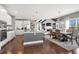 Open concept kitchen and dining area with views to the living room and backyard at 5075 Havenbrooke Ct, Cumming, GA 30040