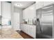 Modern kitchen with stainless steel appliances and white cabinets at 5075 Havenbrooke Ct, Cumming, GA 30040