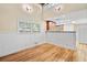 Dining room with hardwood floors and bar access to the kitchen at 609 Redwood Drive Dr, Woodstock, GA 30189