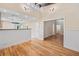 Dining room with hardwood floors and bar access to the kitchen and hallway at 609 Redwood Drive Dr, Woodstock, GA 30189