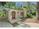 Inviting home featuring a decorative front door, manicured lawn, and well-maintained exterior at 609 Redwood Drive Dr, Woodstock, GA 30189