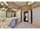 Bright bathroom boasts double vanity, ample lighting, and separate entrance at 10125 Brixton Pl, Suwanee, GA 30024