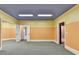 Spacious bonus room featuring multiple doorways and a neutral color scheme, offering flexibility for various uses at 10125 Brixton Pl, Suwanee, GA 30024