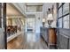 Grand foyer showcasing hardwood floors, staircase, and entry to dining room at 10125 Brixton Pl, Suwanee, GA 30024
