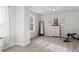 Bright bonus room with neutral walls and carpet featuring workout equipment and storage at 242 Crestbrook Ln, Dallas, GA 30157