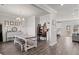 Open dining room with hardwood floors and lots of natural light at 242 Crestbrook Ln, Dallas, GA 30157