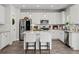 Well-lit kitchen with white cabinets, stainless appliances, and a center island at 242 Crestbrook Ln, Dallas, GA 30157