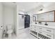 Well-lit bathroom with double vanity, tiled shower, and modern fixtures at 3356 Thornewood Dr, Atlanta, GA 30340