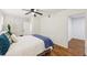 Cozy bedroom featuring wood-look floors, closet and ceiling fan at 3356 Thornewood Dr, Atlanta, GA 30340