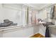 Walk-in closet with shelves, hanging rods, and wood flooring at 3356 Thornewood Dr, Atlanta, GA 30340