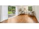 Inviting seating area with hardwood floors, leading to a patio with sliding glass doors at 3356 Thornewood Dr, Atlanta, GA 30340