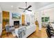 Bright living room with a fireplace, hardwood floors, and an open-concept design at 3356 Thornewood Dr, Atlanta, GA 30340
