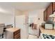 A well-lit kitchen offers a range and refrigerator at 4470 Hopkins Lake Nw Dr, Duluth, GA 30096