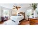 Bedroom with hardwood floors, ceiling fan, and windows at 773 N Superior Ave, Decatur, GA 30033