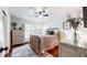 Cozy bedroom with hardwood floors and a ceiling fan at 773 N Superior Ave, Decatur, GA 30033