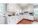 Bright kitchen with white cabinets, stainless steel oven, and natural light at 773 N Superior Ave, Decatur, GA 30033