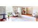 Bright living room with hardwood floors, neutral furniture, and large windows providing ample natural light at 773 N Superior Ave, Decatur, GA 30033