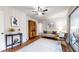Cozy living room featuring hardwood floors, board and batten walls, and sliding glass doors at 773 N Superior Ave, Decatur, GA 30033