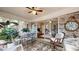 Charming sunroom featuring brick walls, tile flooring, and views of the backyard at 773 N Superior Ave, Decatur, GA 30033