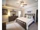 Cozy bedroom with a tray ceiling and neutral decor at 1164 Baylor Nw St, Atlanta, GA 30318