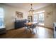 Dining room with stylish light fixture and access to outdoor space at 1164 Baylor Nw St, Atlanta, GA 30318