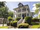 Charming two-story home with a welcoming front porch and manicured landscaping at 1164 Baylor Nw St, Atlanta, GA 30318