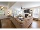 Bright living room with hardwood floors, fireplace, and comfortable seating at 1164 Baylor Nw St, Atlanta, GA 30318