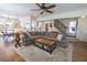 Open-concept living space with dining area and staircase at 1164 Baylor Nw St, Atlanta, GA 30318