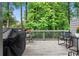 Outdoor patio, perfect for relaxing and enjoying the surrounding green space at 153 Witter Way, Woodstock, GA 30188