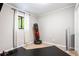 Minimalist bedroom with hardwood floors, natural light and exercise equipment at 2022 Ramblewood Ne Ct, Marietta, GA 30062