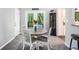 Cozy dining area with access to the outside deck through glass doors at 2022 Ramblewood Ne Ct, Marietta, GA 30062
