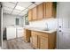 Efficient laundry room with cabinets and sink, plus lots of storage at 2022 Ramblewood Ne Ct, Marietta, GA 30062