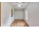 Bedroom closet featuring wood laminate flooring and natural lighting at 2088 Blackberry Ln, Auburn, GA 30011