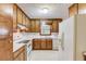 Functional kitchen with classic cabinets, white countertops, and modern appliances, perfect for everyday meals at 2088 Blackberry Ln, Auburn, GA 30011